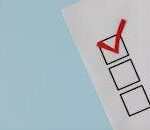 OEA A simple white paper checklist with one red checkmark, ideal for concepts like completion or approval.